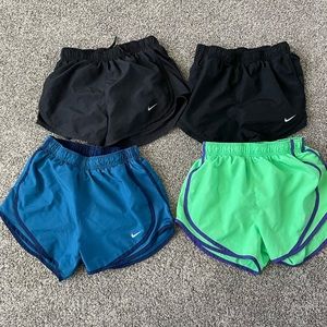 4 pairs of Nike xs shorts